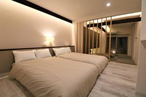 Krevet ili kreveti u jedinici u okviru objekta Smart Stay Ito 302