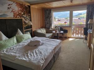 Łóżko lub łóżka w pokoju w obiekcie Hotel Sägerhof