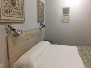 A bed or beds in a room at Agroturismo Ibarra
