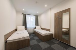 Posteľ alebo postele v izbe v ubytovaní Hostel SMS FREE PARKING