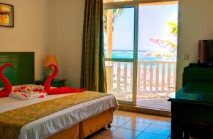 Ένα ή περισσότερα κρεβάτια σε δωμάτιο στο Silver Beach Hotel