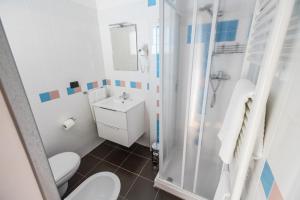 Koupelna v ubytování Hotel Murgia + 35 fotografií