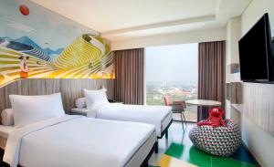 Letto o letti in una camera di ibis Styles Bandung Grand Central