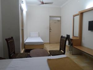 Fotografie z fotogalerie ubytování Hotel Pasuparthy Residency v destinaci Tirupati + 18 fotografií