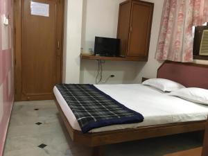 Postel nebo postele na pokoji v ubytování Hotel GRG