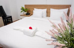 Postel nebo postele na pokoji v ubytování H79 HOTEL
