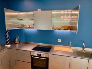 Кухня або міні-кухня у LA FORESTALE Luxury Ecolodge Piano Terra- Appt