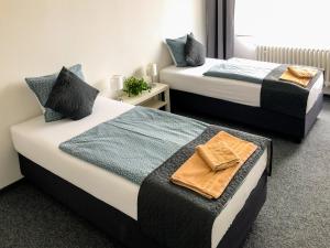 Postel nebo postele na pokoji v ubytování Hotel Bobr