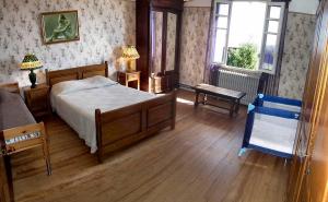 Кровать или кровати в номере Grand gîte de Soumeillan