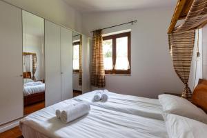 Krevet ili kreveti u jedinici u okviru objekta Solemar Sicilia - Villa Del Faro