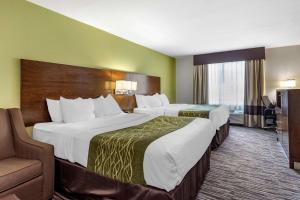 מיטה או מיטות בחדר ב-Comfort Inn & Suites North Little Rock JFK Blvd