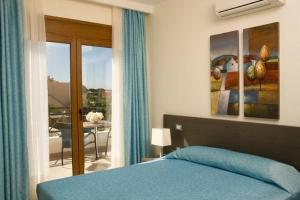 A bed or beds in a room at Executive Rhodes Villa 4 Bedroom - 4 Bathroom Bd Villa Pefkos