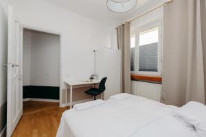 Posteľ alebo postele v izbe v ubytovaní ShortStayPoland Marszałkowska (B12)