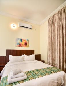 Voodi või voodid majutusasutuse Sinclair Guest House toas