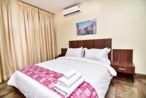 Voodi või voodid majutusasutuse Sinclair Guest House toas