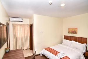 Voodi või voodid majutusasutuse Sinclair Guest House toas