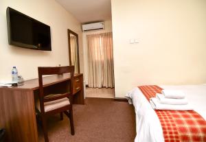 Voodi või voodid majutusasutuse Sinclair Guest House toas