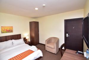 Voodi või voodid majutusasutuse Sinclair Guest House toas