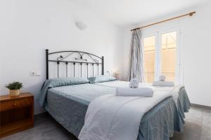 Posteľ alebo postele v izbe v ubytovaní Acapulco Apartments