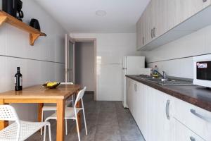 Kuchyňa alebo kuchynka v ubytovaní Acapulco Apartments
