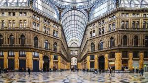 a large building with a glass domed ceiling at Casa Cupiello Via Chiaia - Casa Vacanze ad uso Esclusivo in Naples