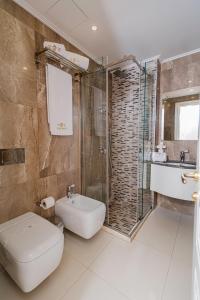 Koupelna v ubytování Eler Hotel