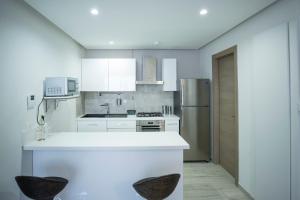 Virtuvė arba virtuvėlė apgyvendinimo įstaigoje C13 Residence Malaga Cosy and spacious 1bd in La Marsa