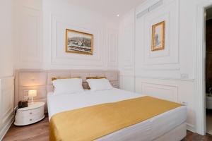 Postel nebo postele na pokoji v ubytování Eler Hotel