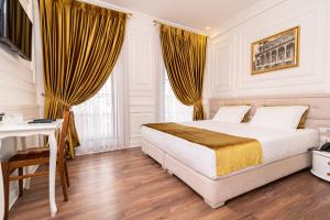 Postel nebo postele na pokoji v ubytování Eler Hotel + 37 fotografií