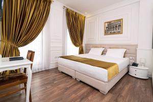 Postel nebo postele na pokoji v ubytování Eler Hotel