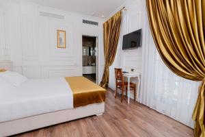 Postel nebo postele na pokoji v ubytování Eler Hotel