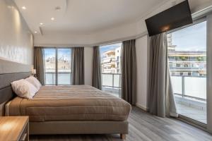 Posteľ alebo postele v izbe v ubytovaní Xenophon Hotel + 37 fotografií