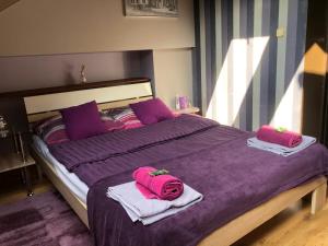 Posteľ alebo postele v izbe v ubytovaní Apartamenty Maria