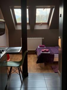 Posteľ alebo postele v izbe v ubytovaní Apartamenty Maria