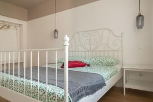 Ένα ή περισσότερα κρεβάτια σε δωμάτιο στο Da Coco - Apartments