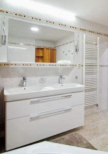 Kúpeľňa v ubytovaní Apartman Štefánik by ZAŽI
