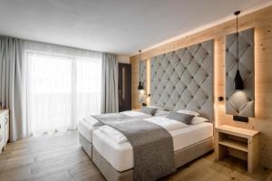 Voodi või voodid majutusasutuse Hotel Arkadia - "Adults Only" toas