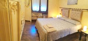 Postel nebo postele na pokoji v ubytování Bed & Breakfast A San Siro 75
