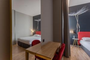 Un ou plusieurs lits dans un hébergement de l'établissement Ibis Styles Toulouse Capitole