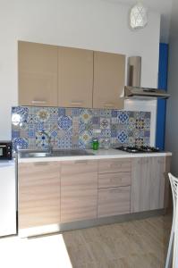 Kuchyňa alebo kuchynka v ubytovaní Casa Vacanze Monte Cofano