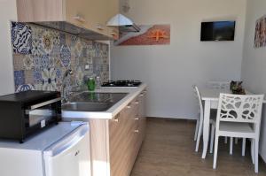 Kuchyňa alebo kuchynka v ubytovaní Casa Vacanze Monte Cofano