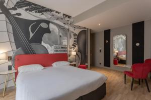 Un ou plusieurs lits dans un hébergement de l'établissement Ibis Styles Toulouse Capitole