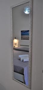 Posteľ alebo postele v izbe v ubytovaní Casa Vacanze Monte Cofano