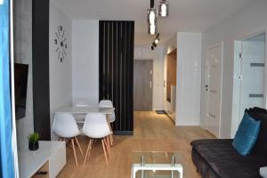 Posedenie v ubytovaní Apartamenty DK9 Promenada Gwiazd 14