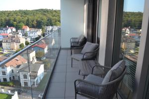 Balkón alebo terasa v ubytovaní Apartamenty DK9 Promenada Gwiazd 14