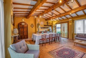 a large living room with a table and chairs at Agriturismo Buonasera in Bagnoregio