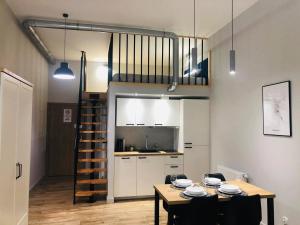 A cozinha ou kitchenette de Property Apart - Soft Lofty Legnicka Centrum