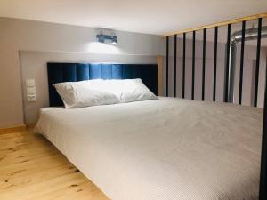 Postel nebo postele na pokoji v ubytování Property Apart - Soft Lofty Legnicka Centrum