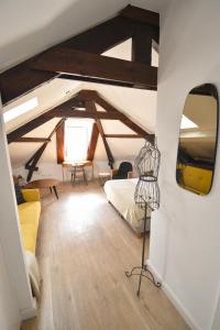 a room with a wooden floor and a wooden floor at Sophia Residences in Coimbra