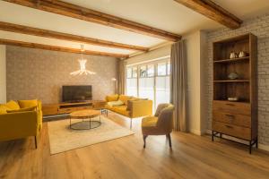 TV a/nebo společenská místnost v ubytování KajüteSiebenZwo